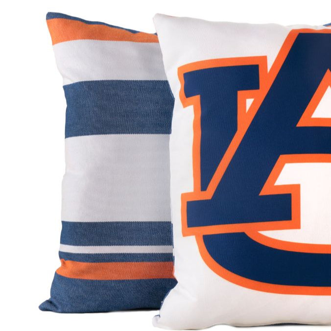 Auburn University colors pillow with orange and navy blue stripes, on a white background.
