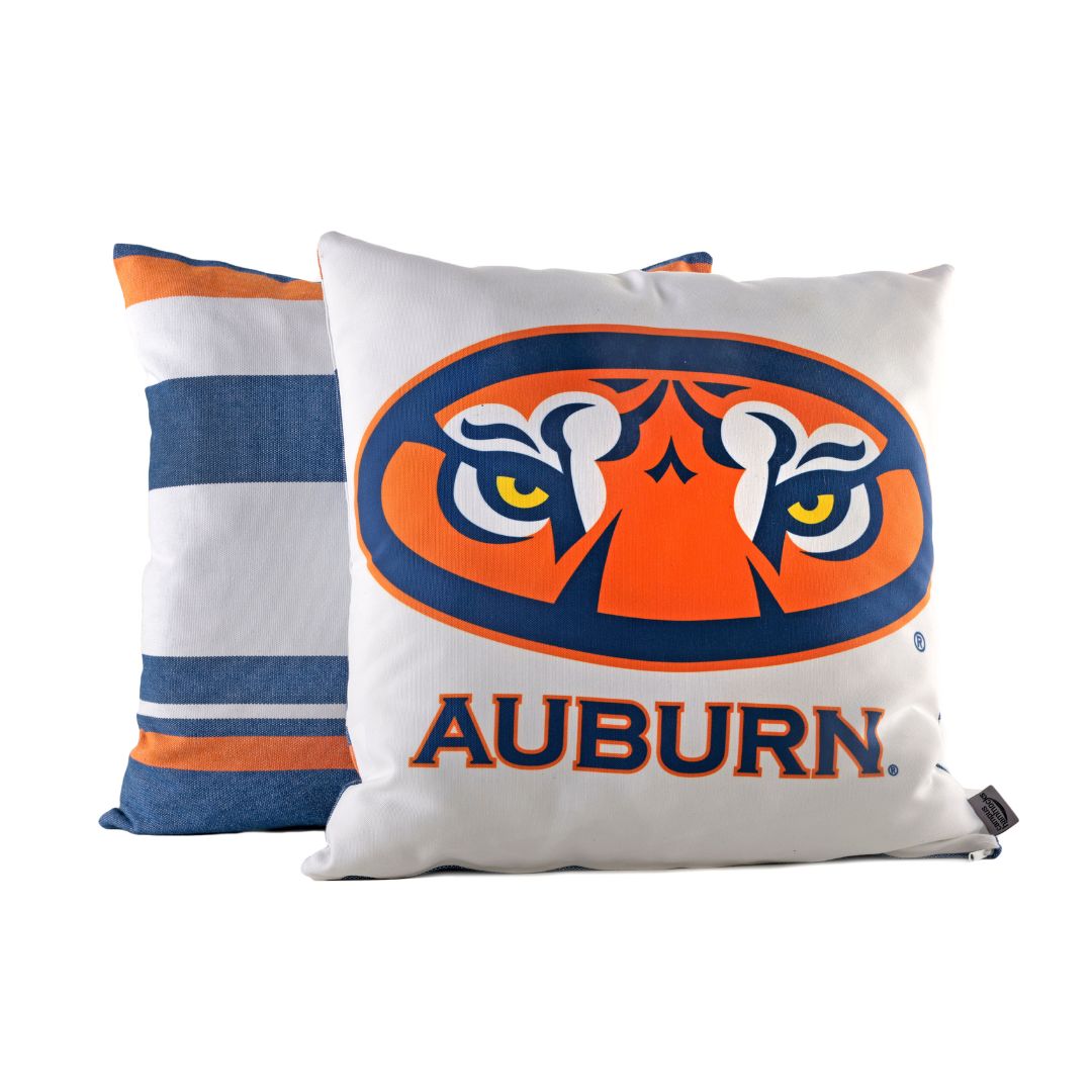 Pillow with Auburn logo and Auburn Tiger Eyes face design on a white background
