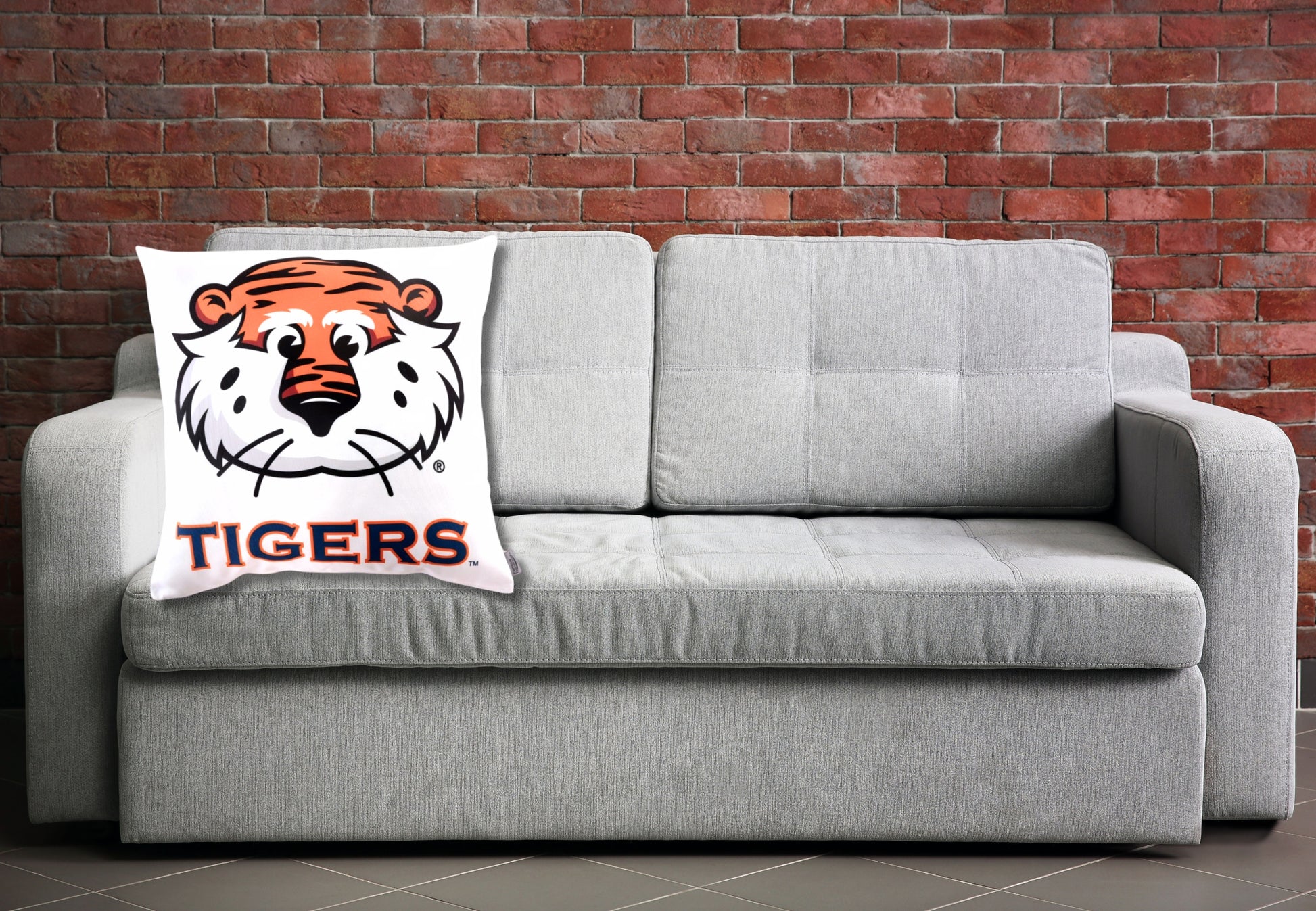 Aubie Tiger Throw pillow on a sofa