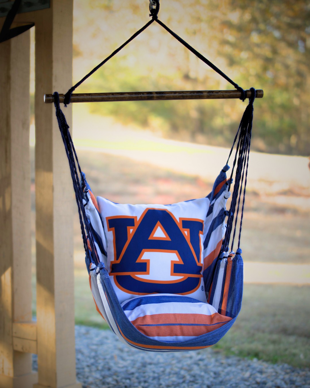 Hanging chair with Auburn University logo in an outdoor setting