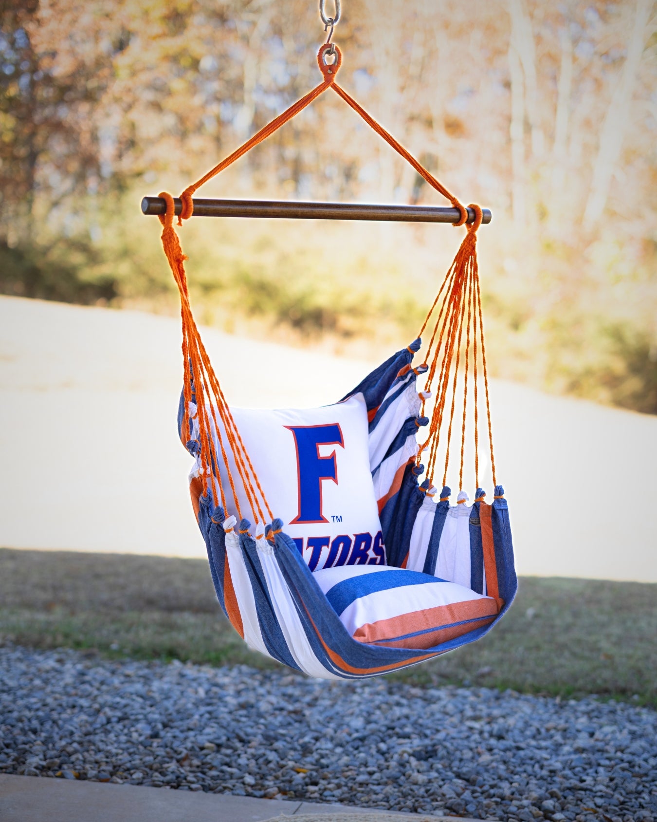 Hammock chair with Florida Gators pattern hanging outdoors