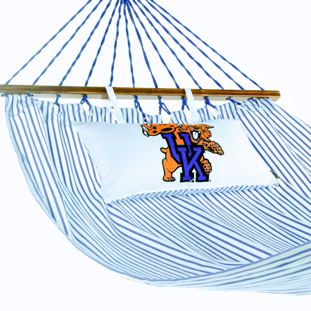 Blue and white striped hammock with a pillow featuring a UK Wildcat logo on a white background