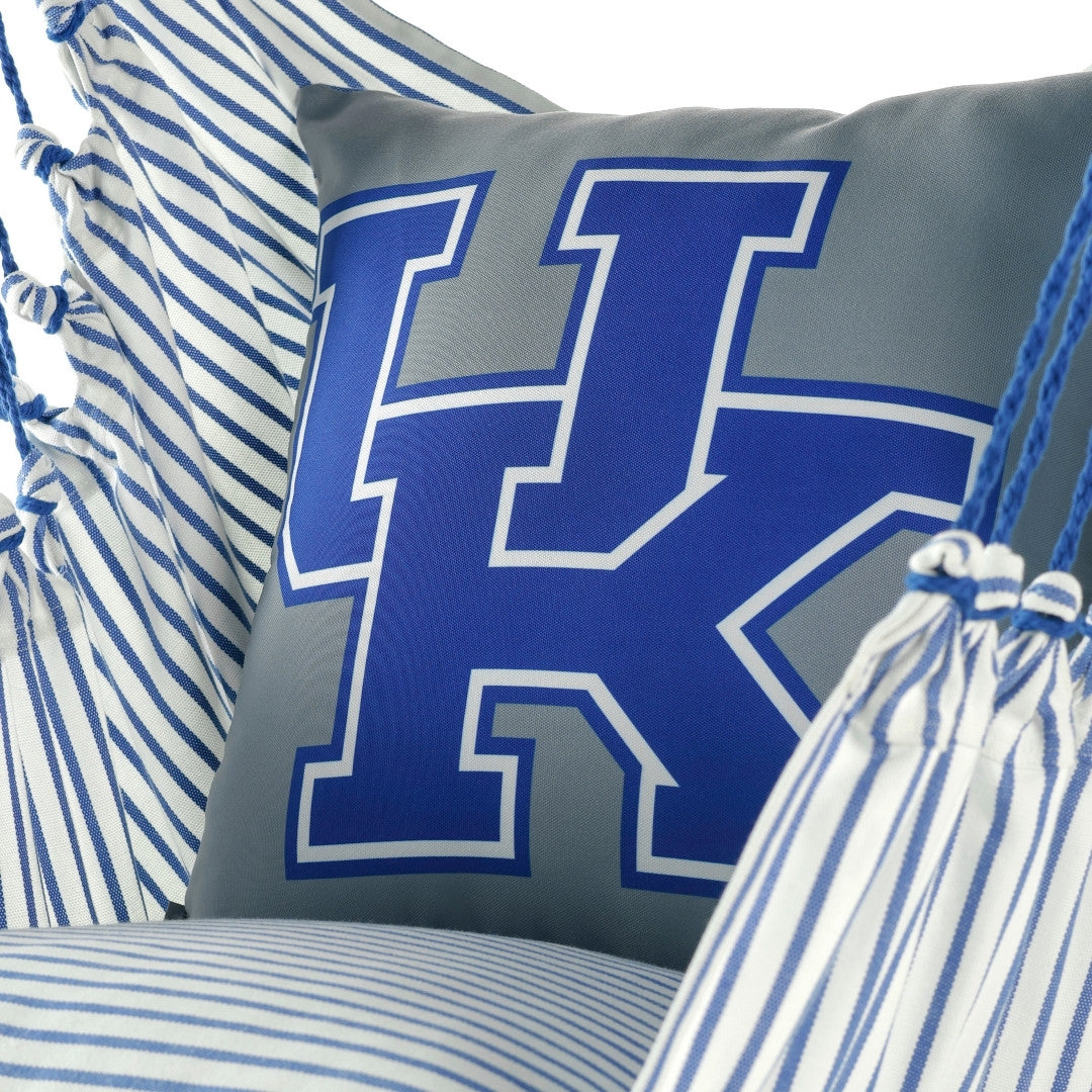 silver pillow with a blue UK University of Kentucky logo surrounded by white and blue striped fabric