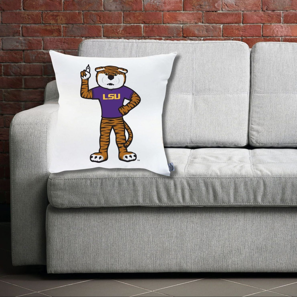 LSU Mike the Tiger pillow cover styled on a gray sofa