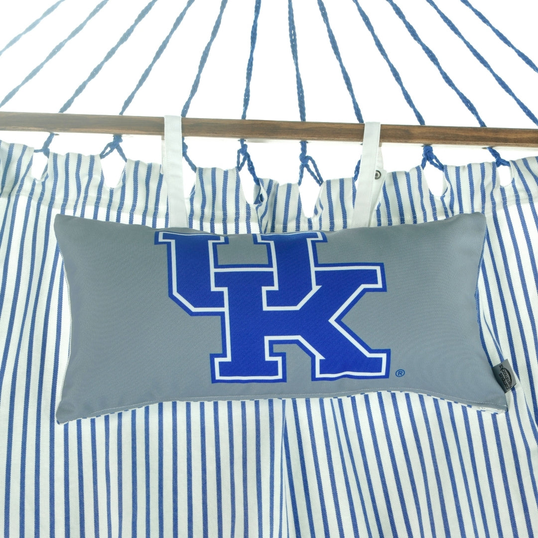 Silver pillow with blue 'UK University of Kentucky' logo on a striped background