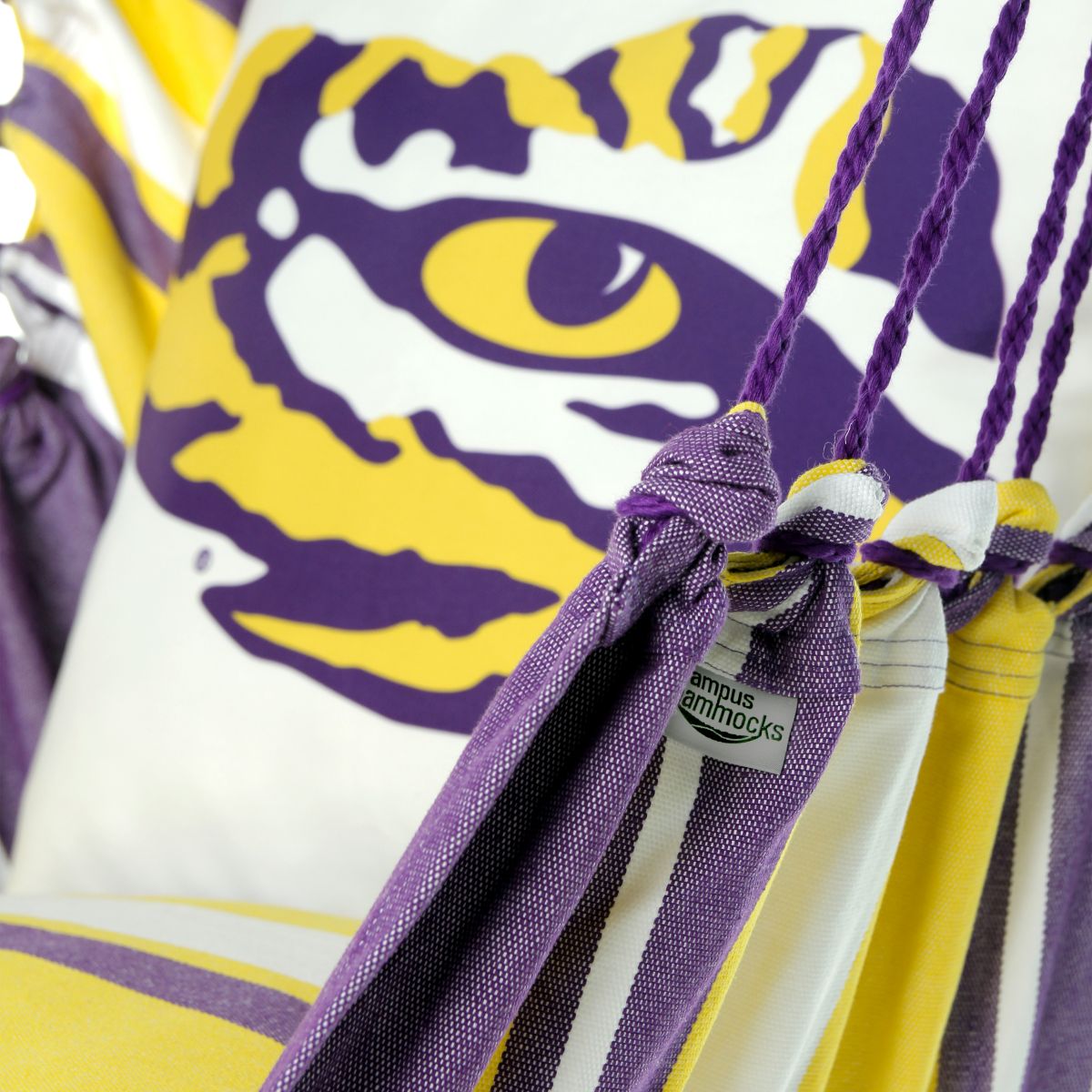 Close-up of a purple and yellow LSU Tigers face pillow cushion 